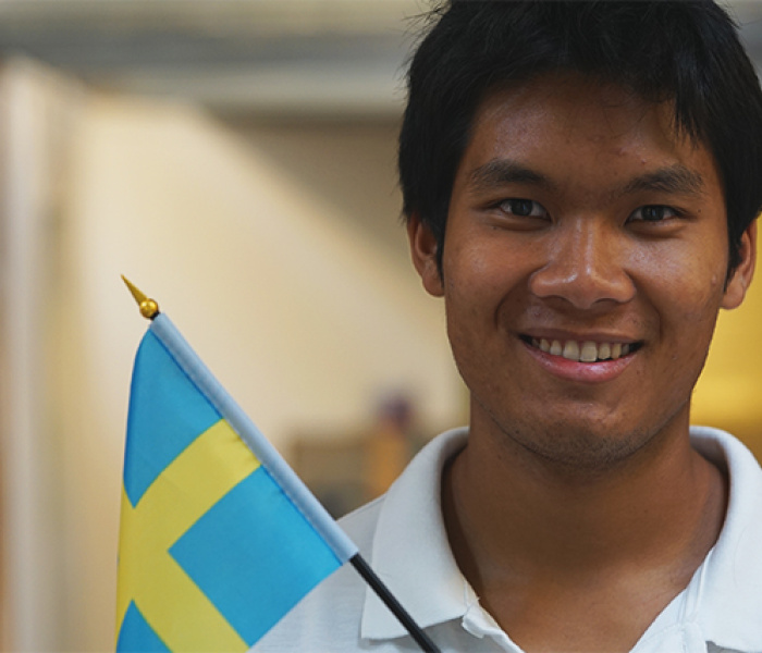 Art Arbsuwan som representerar Sverige på tävlingar inom måleri